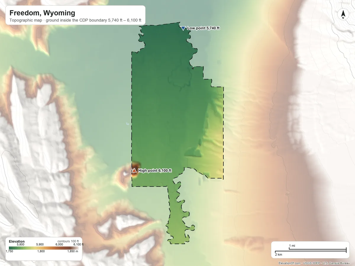 Topographic elevation map of Freedom, Wyoming, shaded from 5,740 ft on the northeast side to 6,100 ft on the south edge, below higher ground just outside