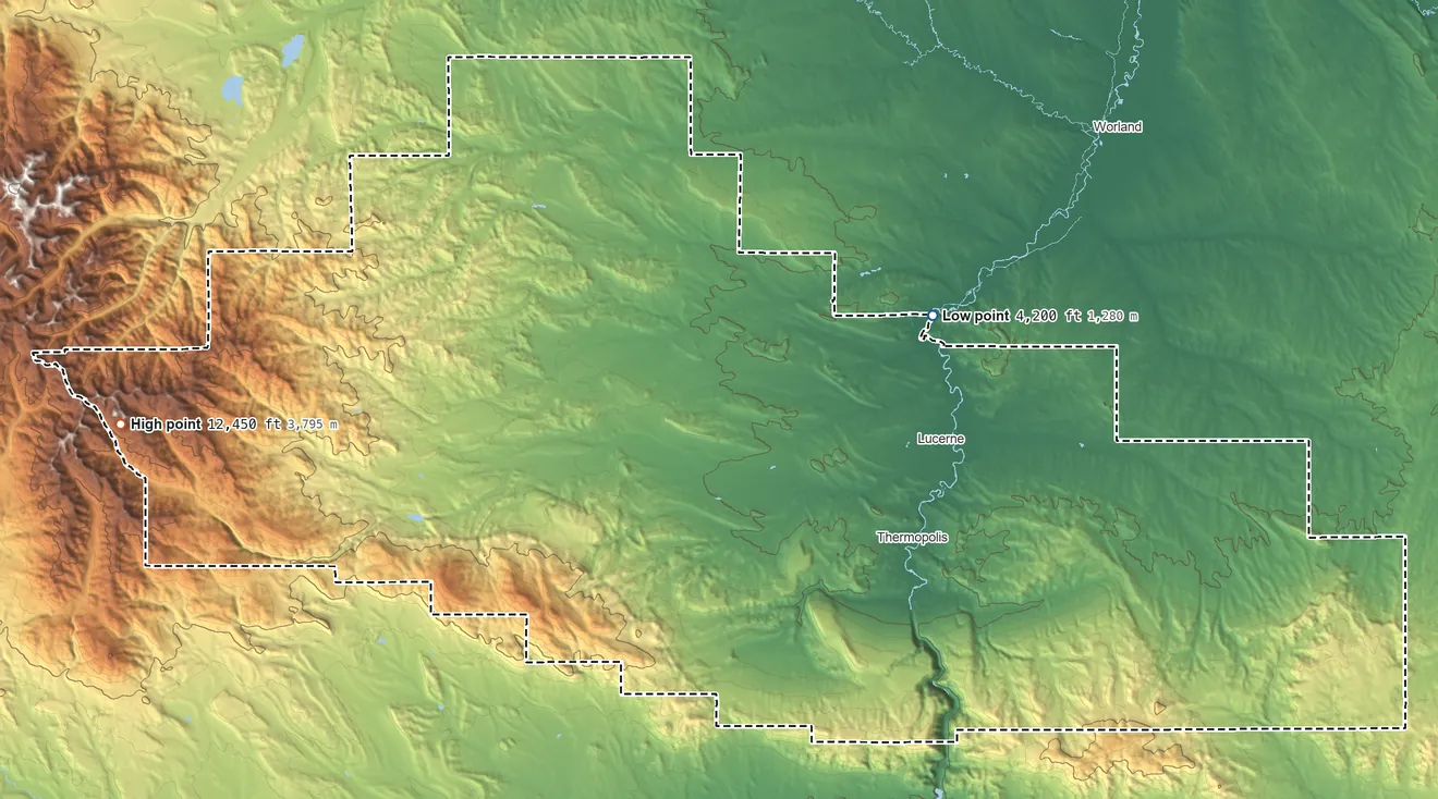 Topographic elevation map of Hot Springs County, Wyoming, shaded from 4,200 ft on the east side to 12,450 ft on Dome Mountain