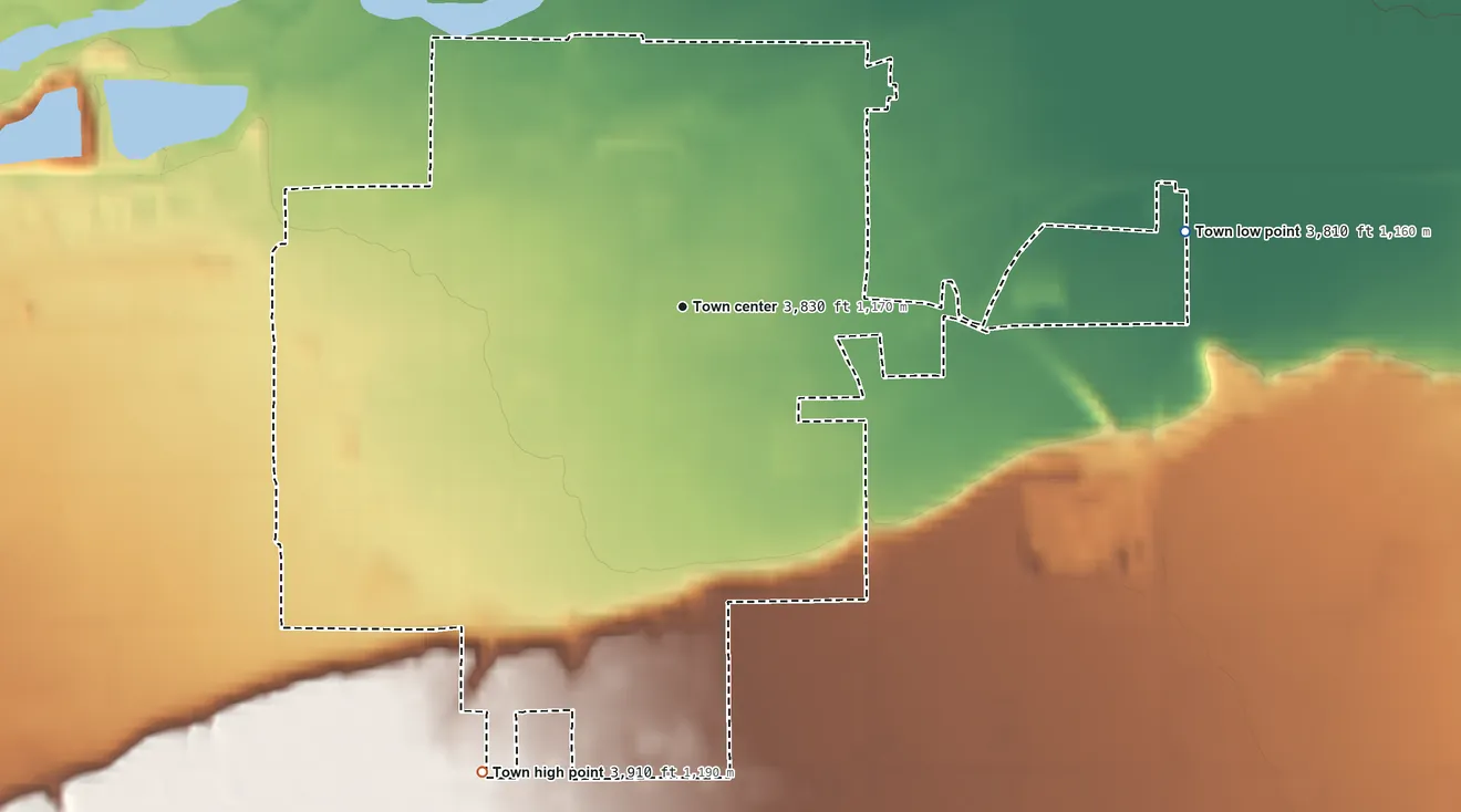 Topographic elevation map of Lovell, Wyoming, shaded from 3,810 ft on the east side to 3,910 ft on the southwest side