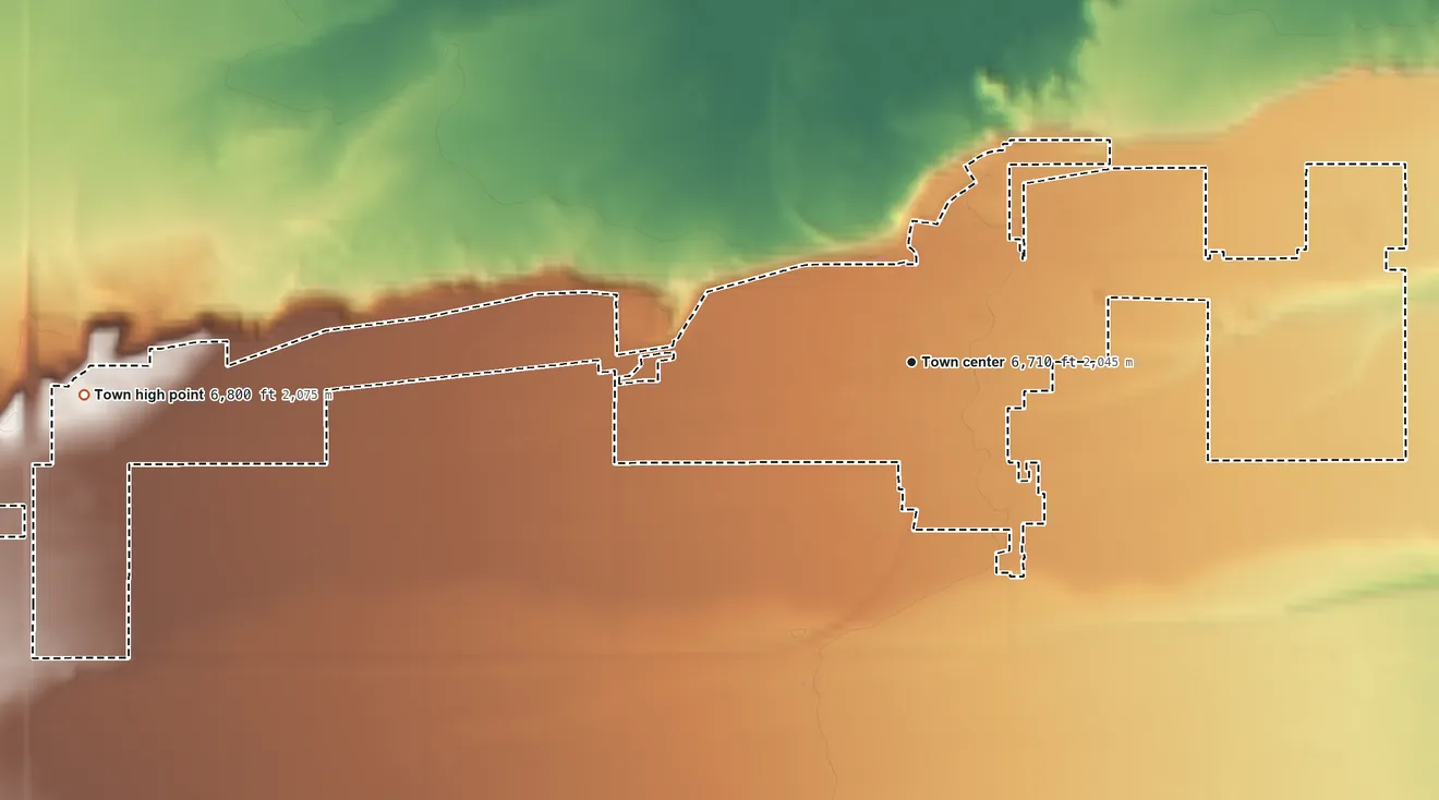 Topographic elevation map of Lyman, Wyoming, shaded from 6,570 ft on the northeast side to 6,800 ft on the west side