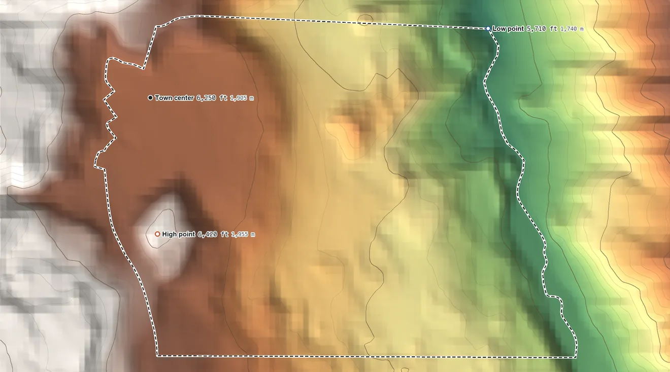 Topographic elevation map of Mammoth, Wyoming, shaded from 5,710 ft on the east side to 6,420 ft on the south edge, below higher ground just outside
