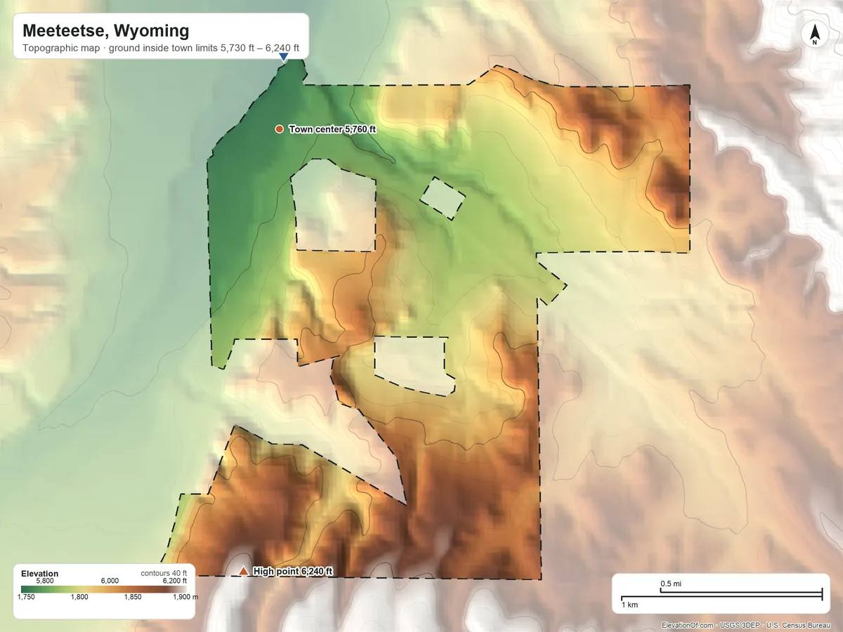 Topographic elevation map of Meeteetse, Wyoming, shaded from 5,730 ft near the middle to 6,240 ft on the south edge, below higher ground just outside
