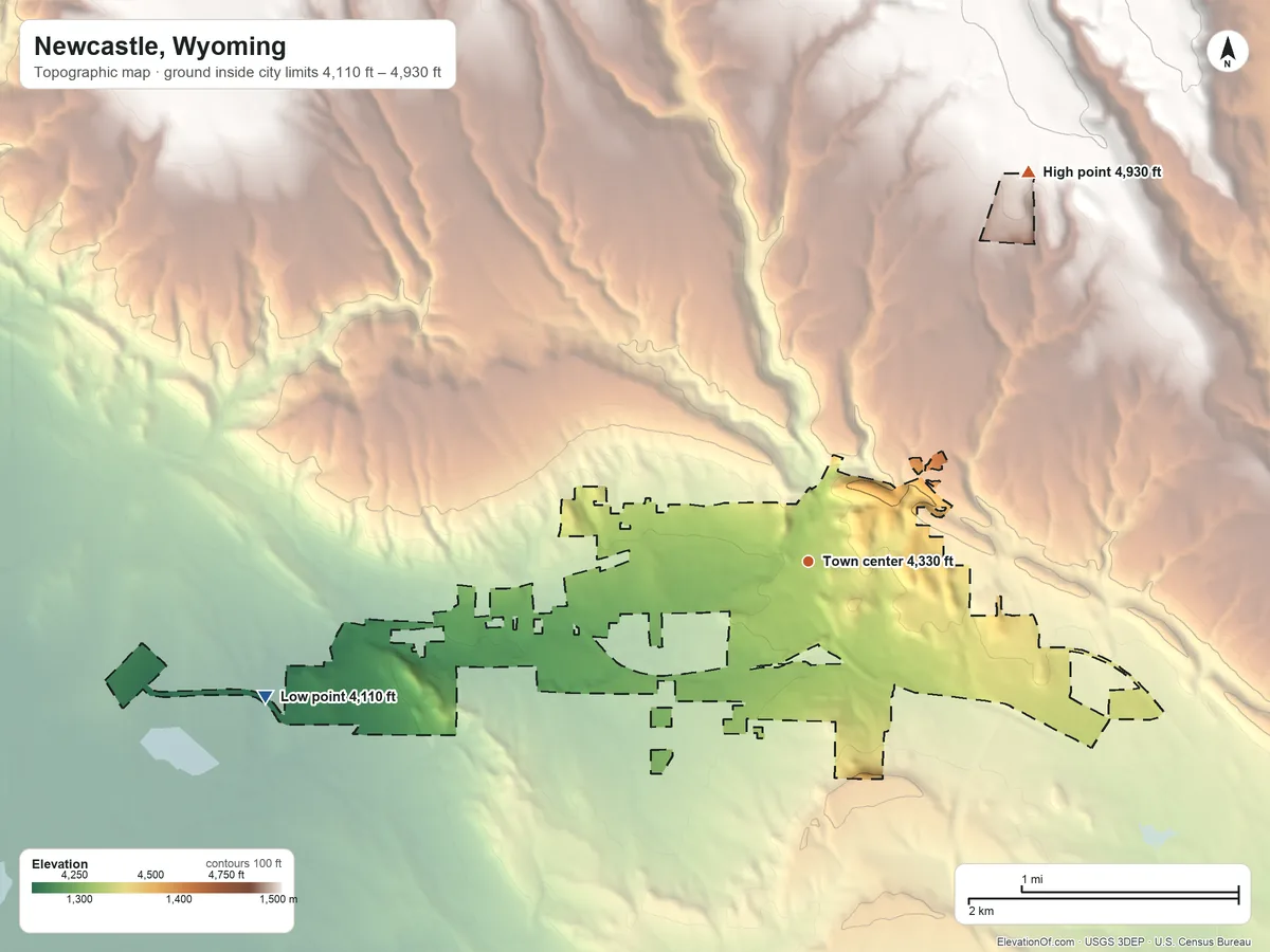 Topographic elevation map of Newcastle, Wyoming, shaded from 4,110 ft on the west side to 4,930 ft on the northeast side