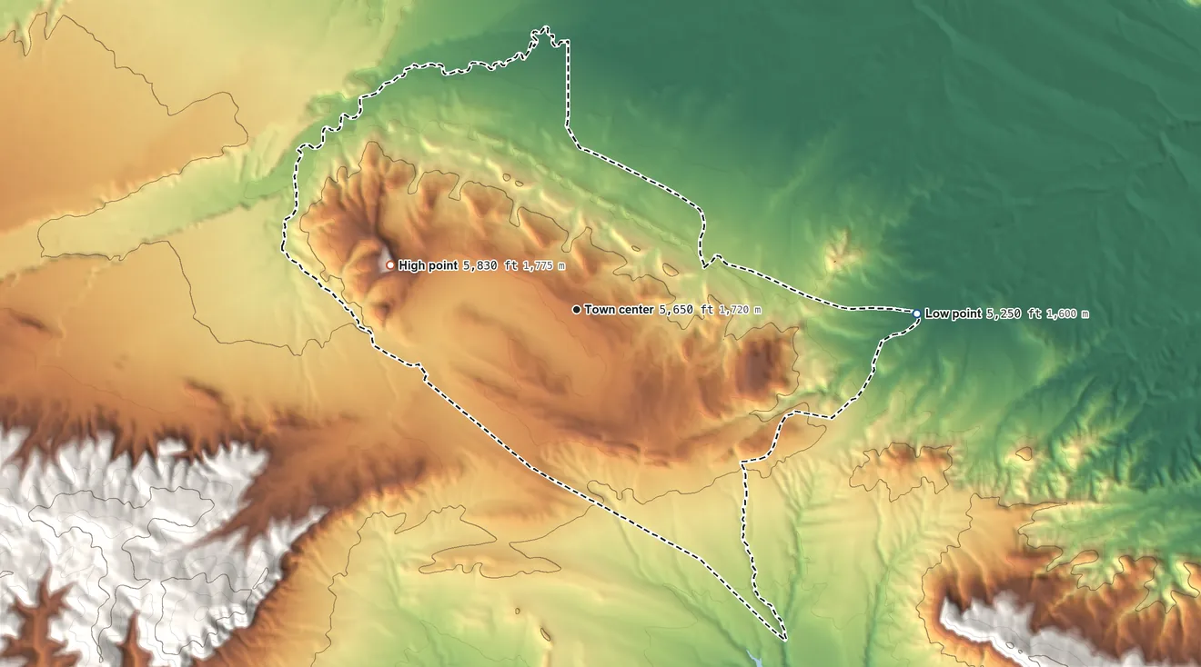 Topographic elevation map of Owl Creek, Wyoming, shaded from 5,250 ft on the east side to 5,830 ft on the west side