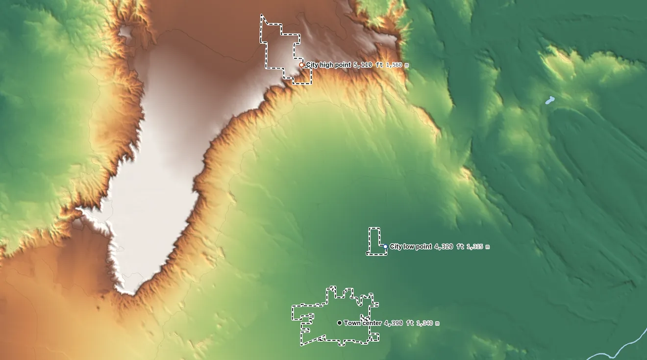 Topographic elevation map of Powell, Wyoming, shaded from 4,320 ft on the northeast side to 5,110 ft on the north side