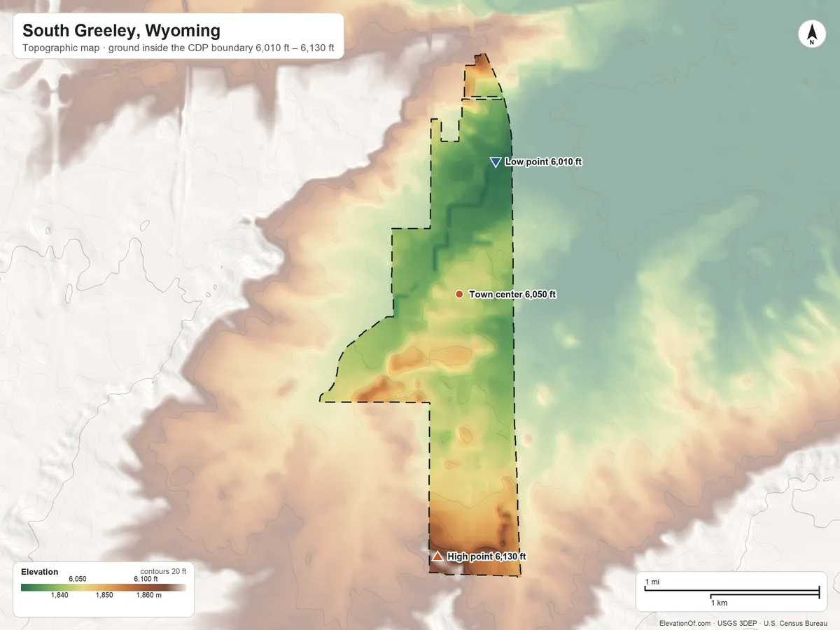 Topographic elevation map of South Greeley, Wyoming, shaded from 6,010 ft on the north side to 6,130 ft on the south side