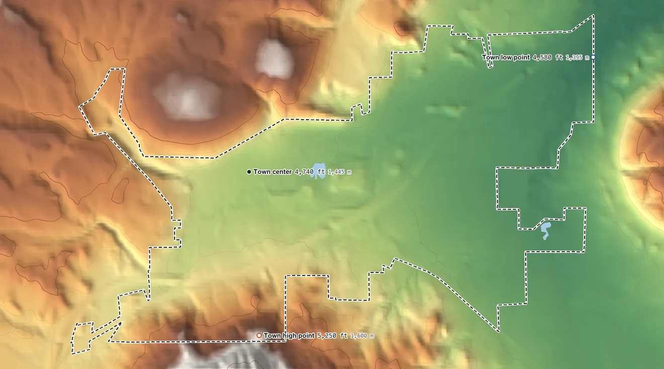 Topographic elevation map of Sundance, Wyoming, shaded from 4,580 ft on the east side to 5,250 ft at the foot of the Bear Lodge Mountains