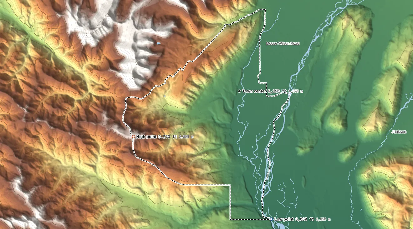 Topographic elevation map of Wilson, Wyoming, shaded from 6,060 ft on the south side to 9,270 ft at the foot of the Rocky Mountains