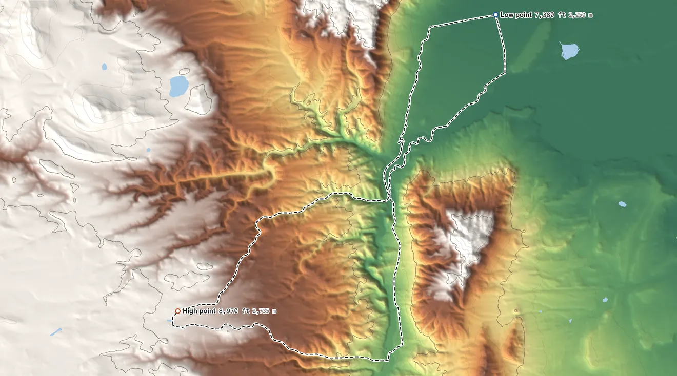Topographic elevation map of Woods Landing-Jelm, Wyoming, shaded from 7,380 ft on the northeast side to 8,970 ft on the southwest side
